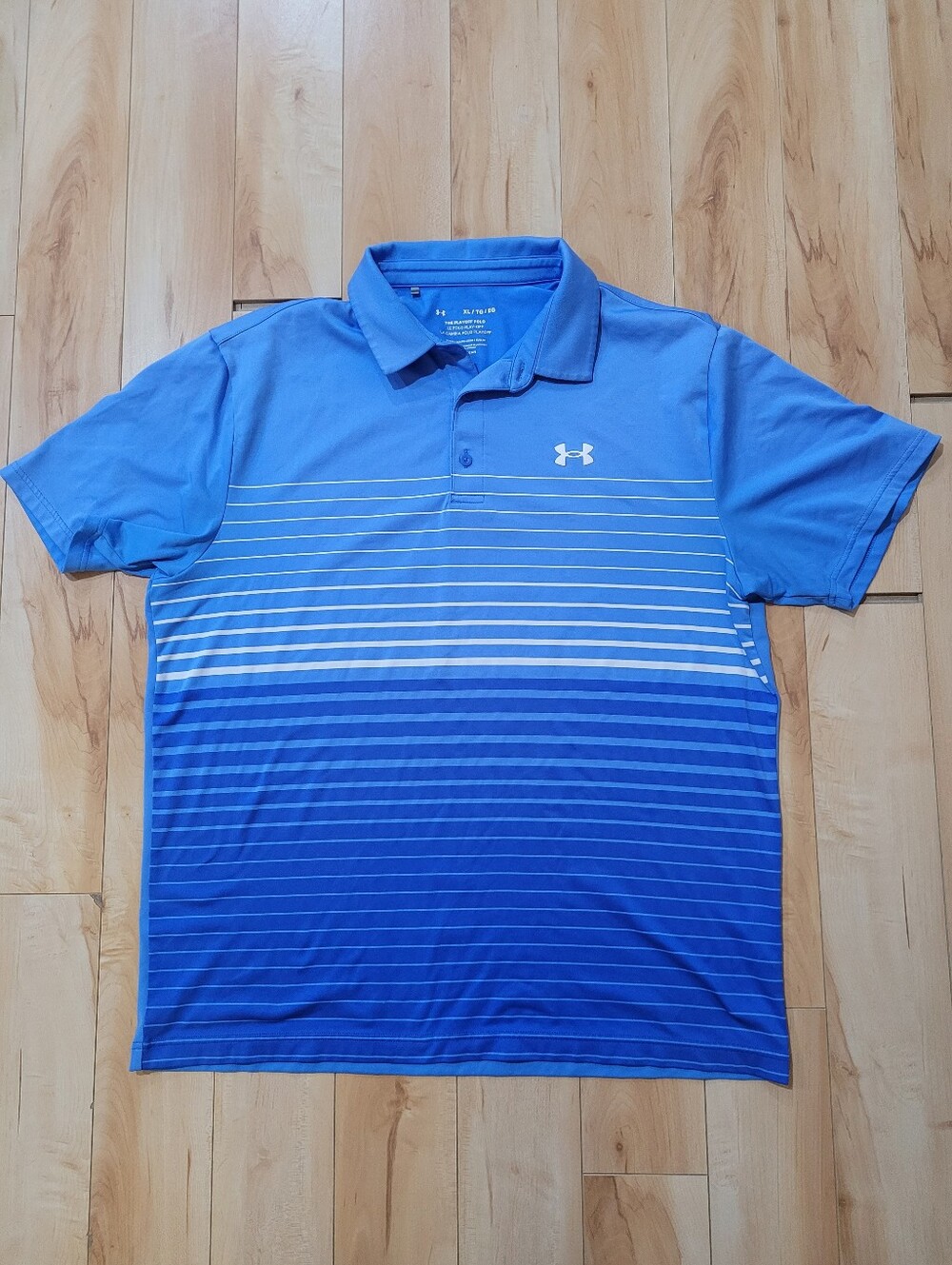 Under Armour men's size XL short sleeve polo shirt